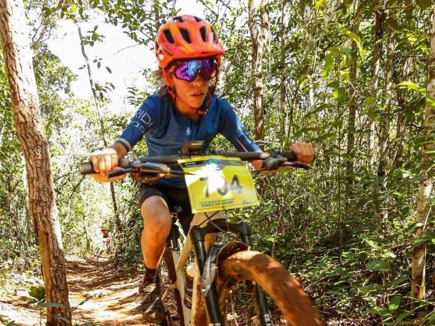 Brazil's Henrique Bravo riding a mountain bike on a trail near his home in Nova Lima