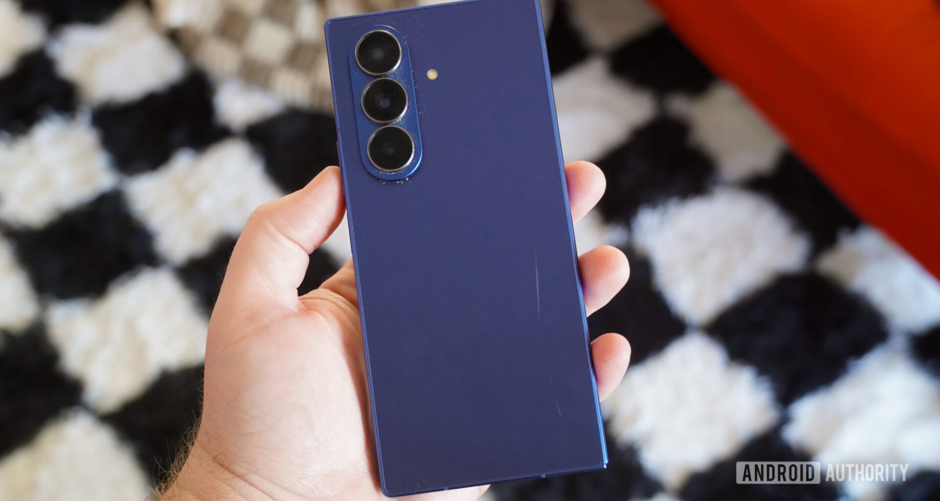 A scratch on a blue Galaxy Z Fold 7.