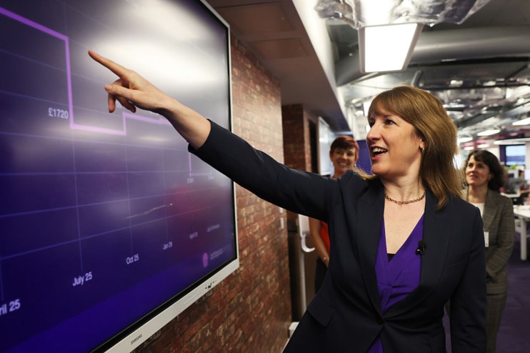 Chancellor Rachel Reeves discussing UK economic strategy at a press conference podium