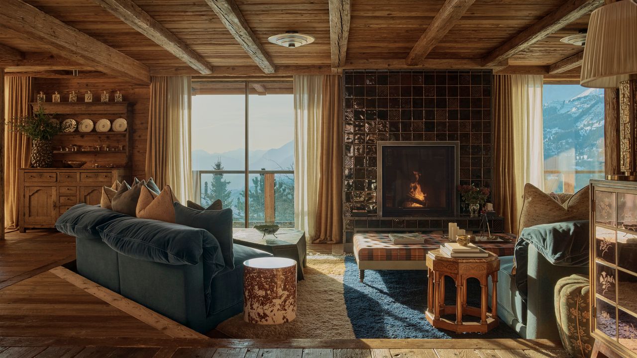 An atmospheric chalet in Crans-Montana, nestled into the side of a mountain, reimagined by Linda Boronkay