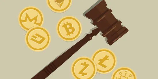 Graphic of gavel surrounded by crypto coins; The Impact of the New UK Cryptoassets Regime on Exisiting Businesses