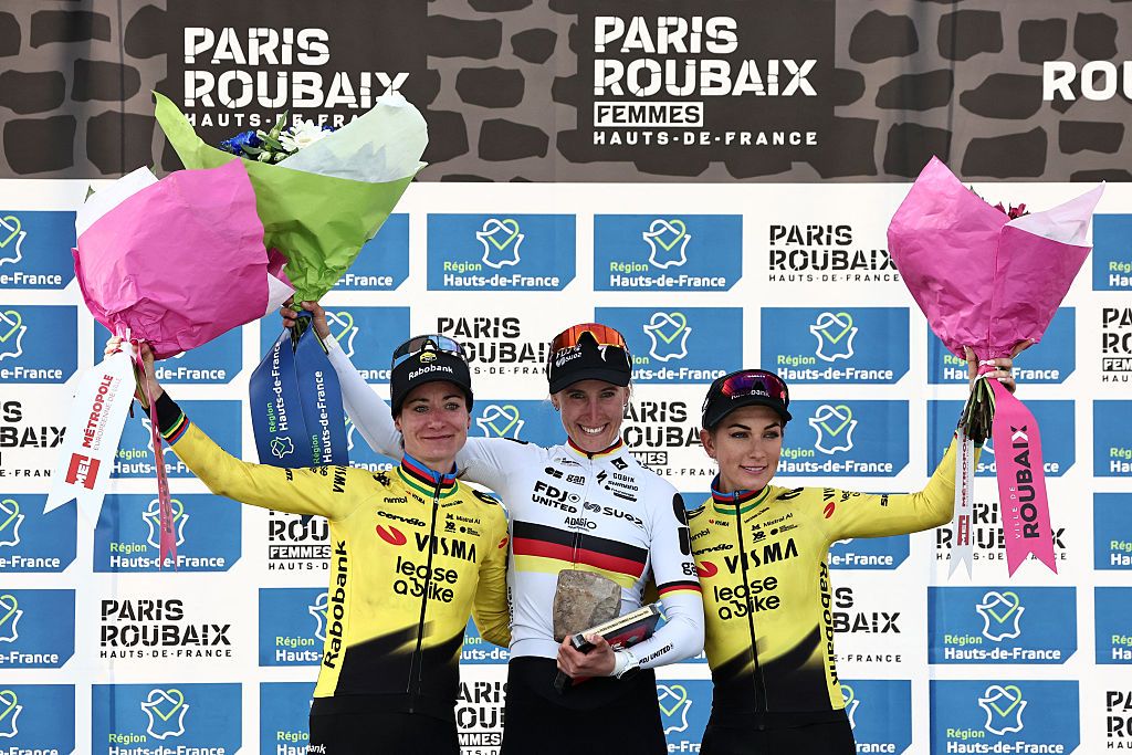 Marianne Vos, Franziska Koch and Pauline Ferrand-Pr&eacute;vot celebrate on the podium of the 6th edition of the Women Paris-Roubaix 2026