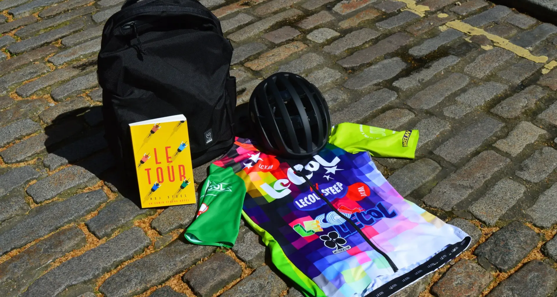In The Drops: BBB Karma helmet, Le Col x Johan Museeuw kit, Chrome Extlek bag, Le Tour book and a concrete velodrome