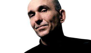 Peter Molyneux smiling at the thought of nfts.