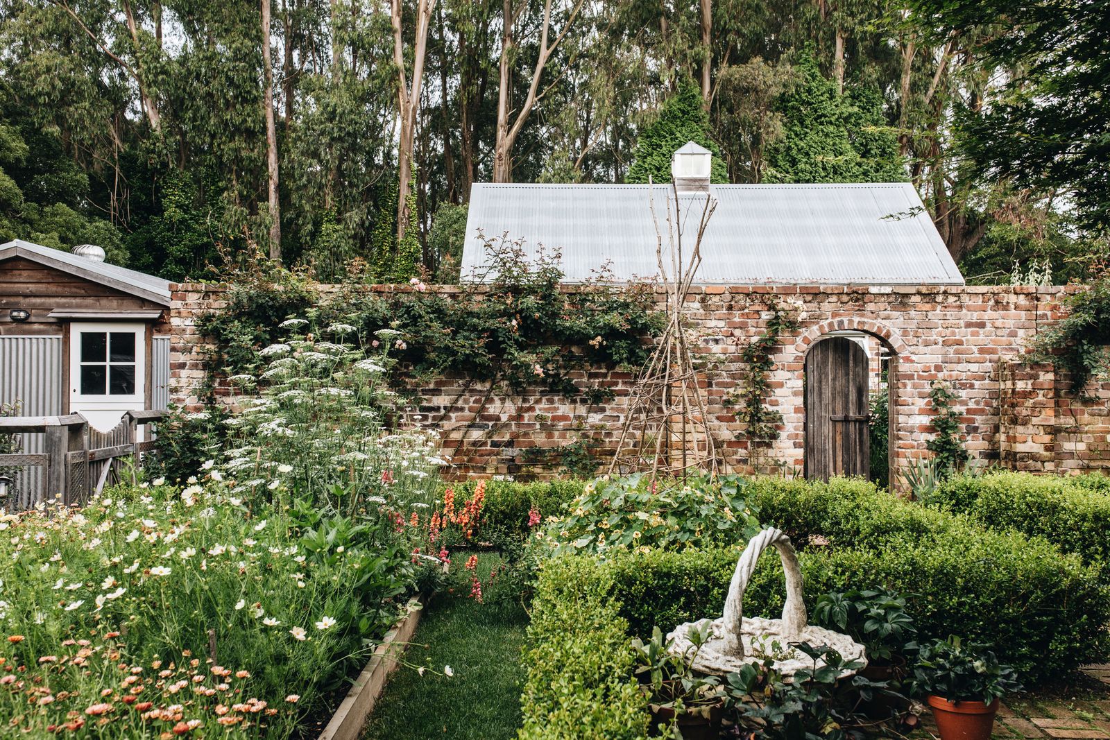 Image may contain Garden Nature Outdoors Indoors Interior Design Backyard Yard Plant Vegetation and Architecture