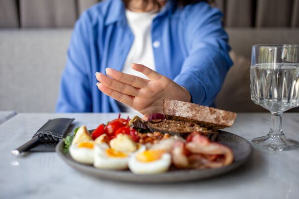 Anonymous woman refusing food