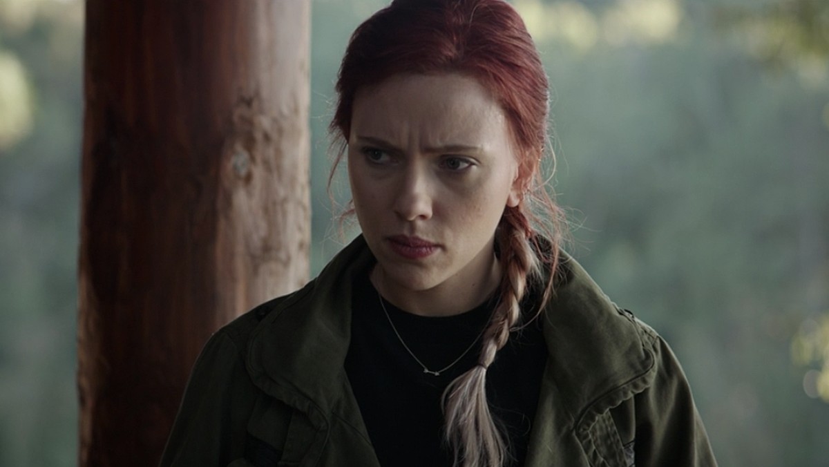 Natasha Romanoff (aka Black Widow) looks sad and wears her hair in a two-tone braid in a scene from Avengers: Endgame.