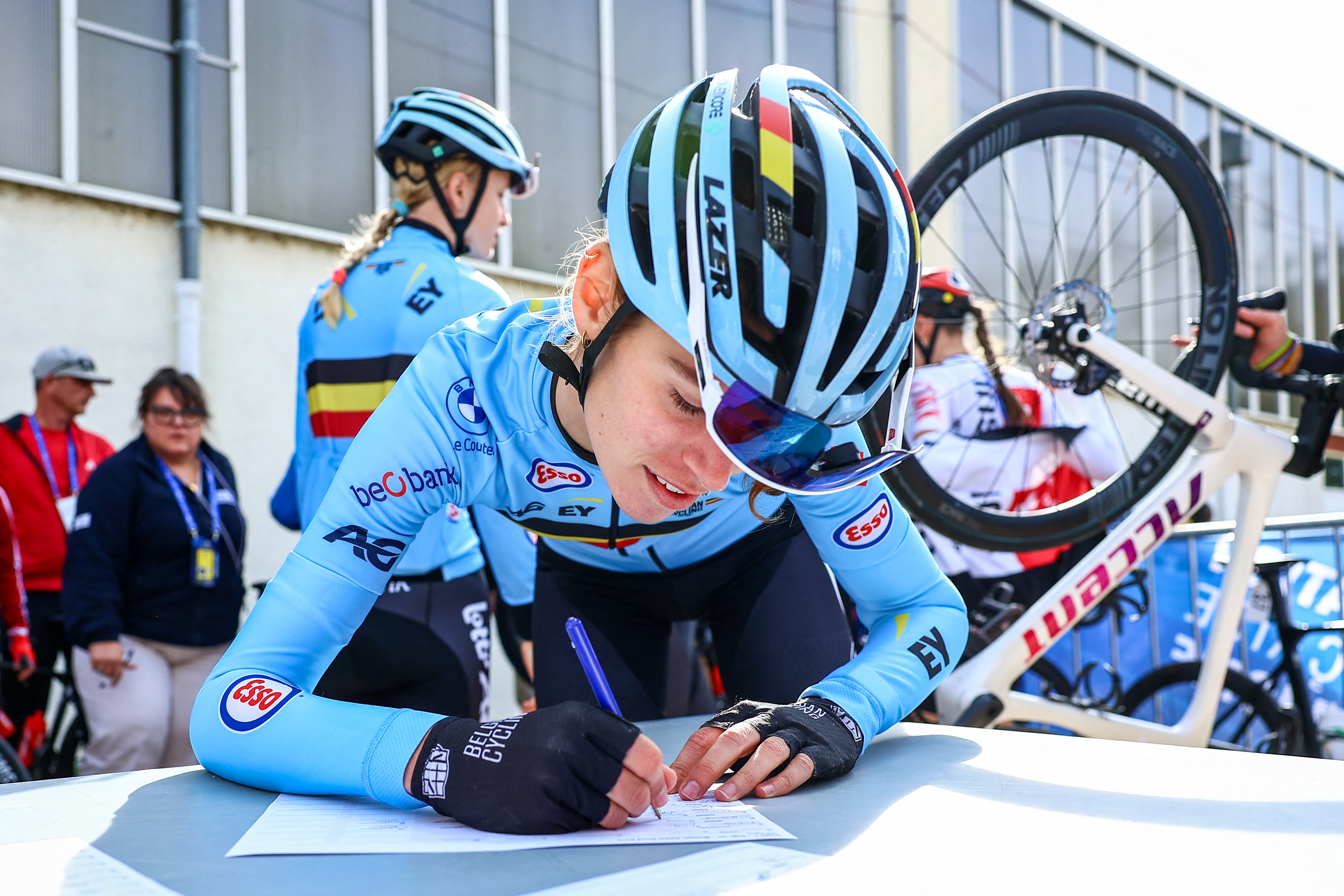 Belgian riders are signing the startlist before the Women Junior Road Race at the UEC road European cycling championships, a 62,9 km track in Loriol-sur-Drome, France on Friday 03 October 2025. The European cycling championships Drome-Ardeche takes place from 1 to 5 October, France. BELGA PHOTO DAVID PINTENS (Photo by DAVID PINTENS / BELGA MAG / Belga via AFP)