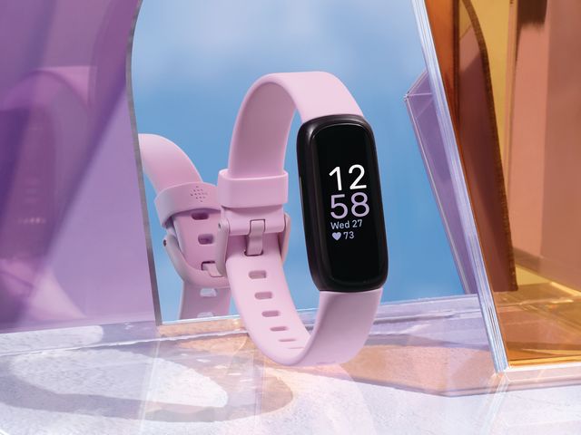 Fitbit Inspire 3 in front of mirror
