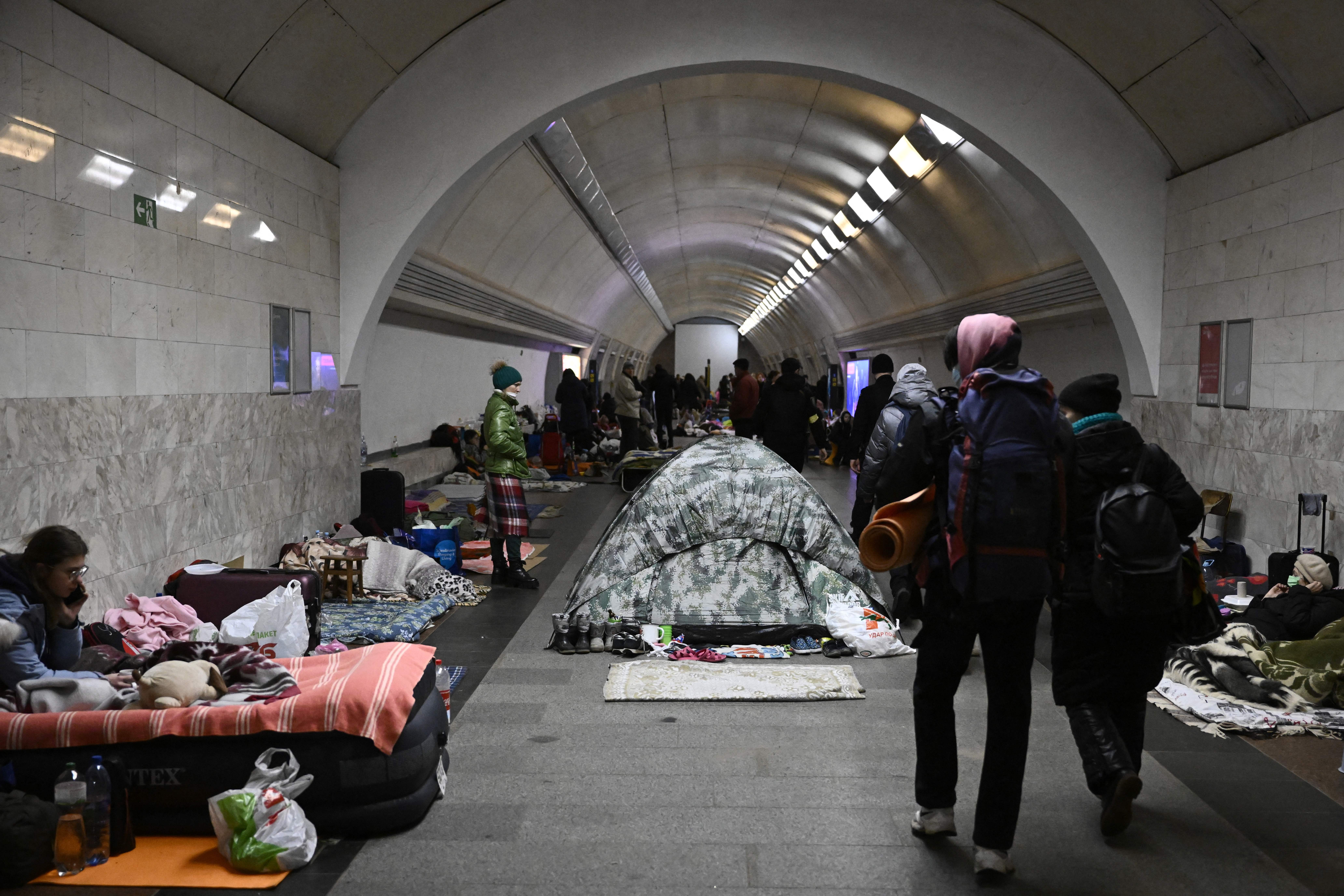 Kyiv residents shelter in a metro station