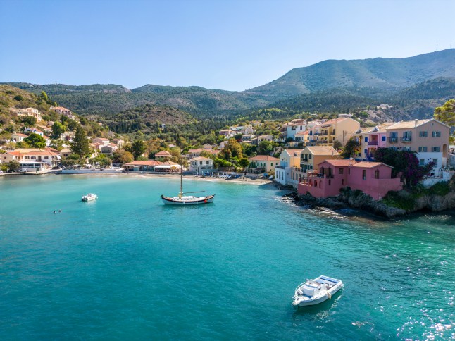 Panoramic aerial view to the picturesque fishing village of Assos, Kefalonia, Greece.