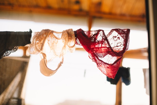 Female panties hanging on a clothesline on the balcony