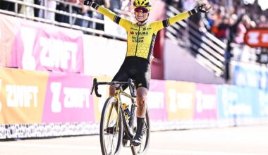 Pauline Ferrand Prevot celebrating as she wins the 2025 Paris–Roubaix Femmes.