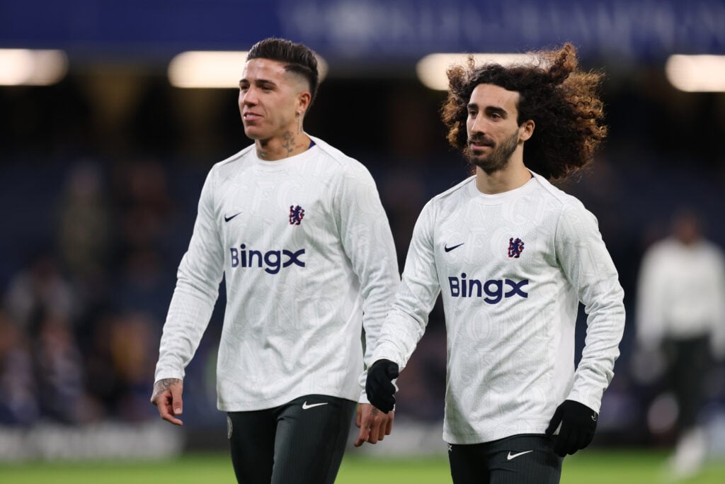Enzo Fernandez and Marc Cucurella of Chelsea interact