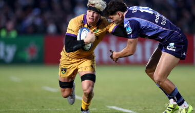 Northampton Saints' Henry Pollock fends off a tackle from Bordeaux Bègles' Nicolas Depoortere during the January 2026 European Champions Cup match.
