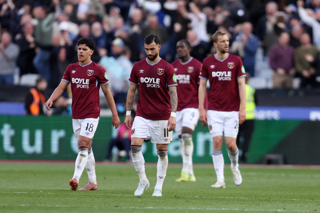 West Ham players look dejected after Leeds score against them in the FA Cup.