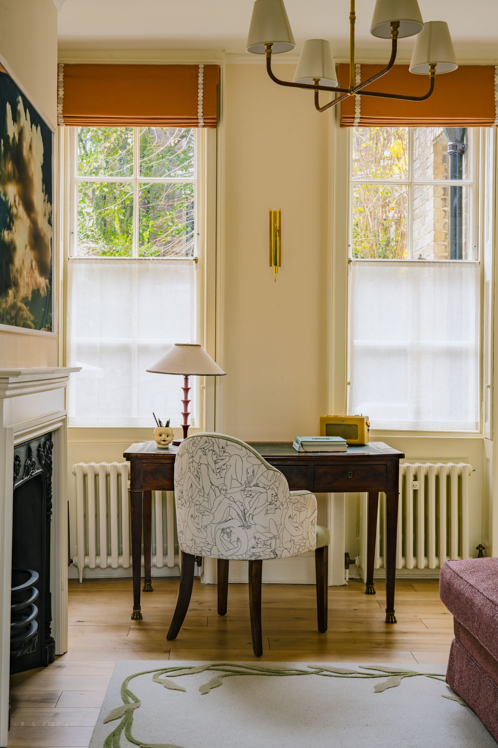 Image may contain Desk Furniture Table Chair Indoors Interior Design Lamp Window and Home Decor