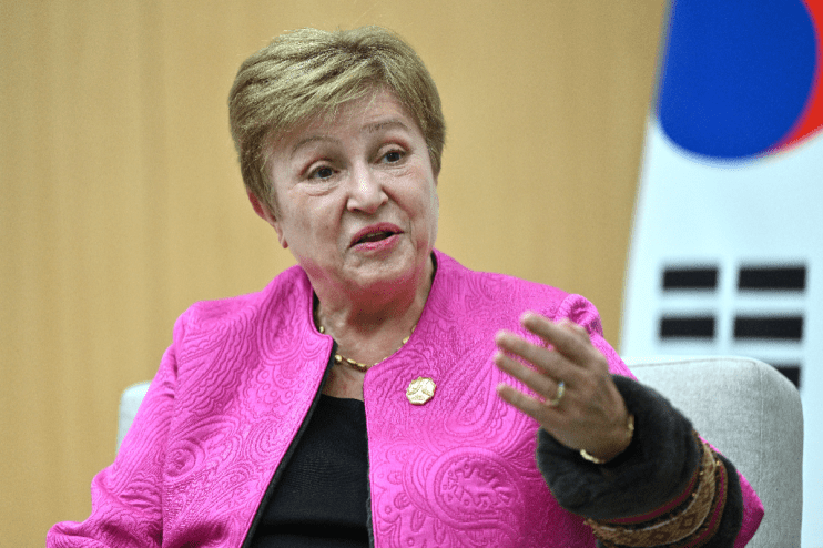 IMF Managing Director Kristalina Georgieva speaking at a press conference, addressing global economic challenges.