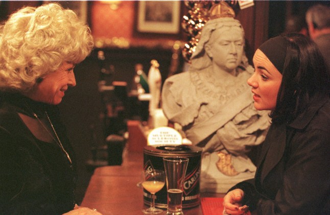 Peggy and Tiffany Mitchell on opposite sides of the bar in the Queen Vic
