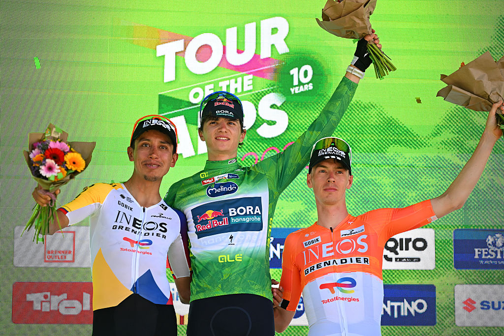 BOZEN-BOLZANO, ITALY - APRIL 24: (L-R) Egan Bernal of Colombia and Team INEOS Grenadiers on second place, overall race winner Giulio Pellizzari of Italy and Team Red Bull - BORA - hansgrohe - Green Leader Jersey and Thymen Arensman of Netherlands and Team INEOS Grenadiers on third place pose on the podium ceremony after the 48th Tour of the Alps 2026, Stage 5 a 128.6km stage from Trento to Bozen-Bolzano on April 24, 2026 in Bozen-Bolzano, Italy. (Photo by Tim de Waele/Getty Images)