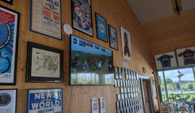 Wall with photos and a tv