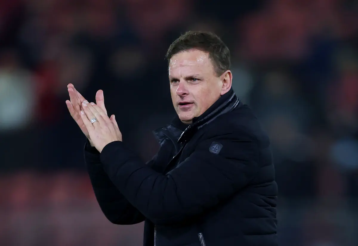 Leyton Orient boss Richie Wellens applauds the fans