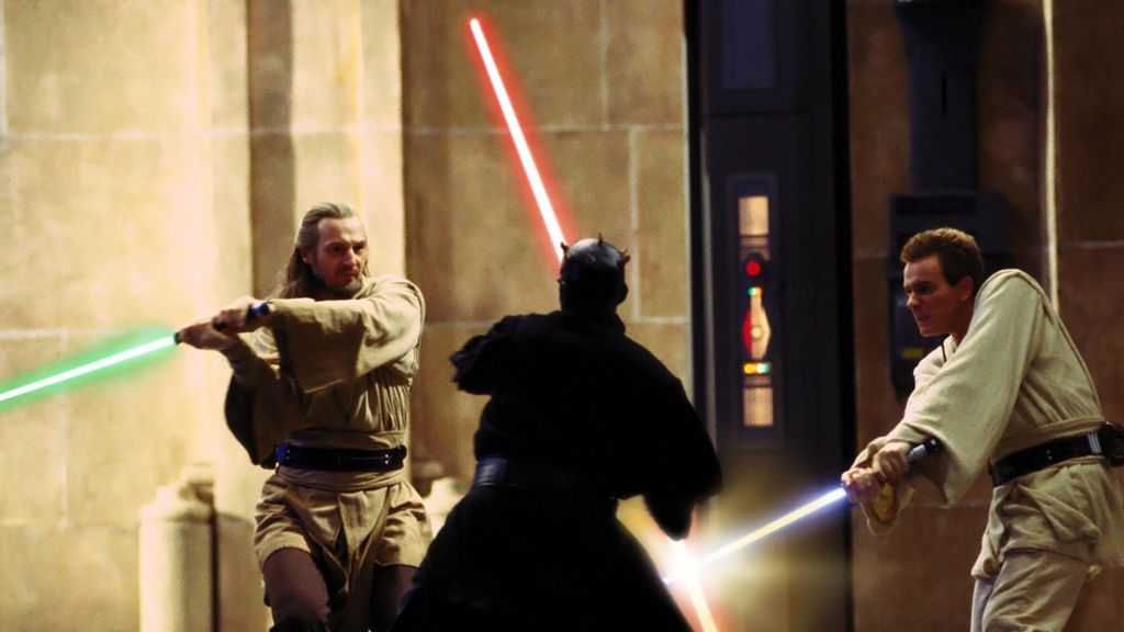 Liam Neeson as Qui-Gon Jinn and Ewan McGregor as Obi-Wan Kenobi fighting Ray Park as Darth Maul in Star Wars The Phantom Menace