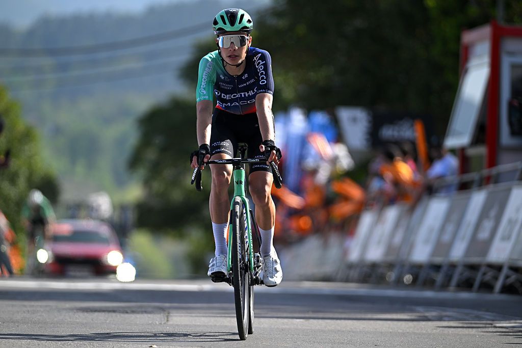 A shot of Decathlon CMA CGM's Matthew Riccitello crossing the line alone, looking neutral, at the finish of a stage of Itzulia Basque Country 2026