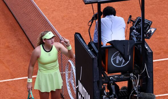 Mirra Andreeva arguing a line call with the umpire Mirra Andreeva arguing a line call with the umpire