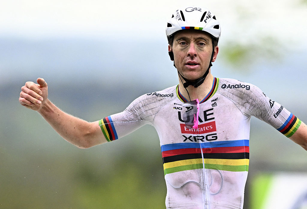 Tadej Pogacar celebrates winning the men's 2025 La Fleche Wallonne