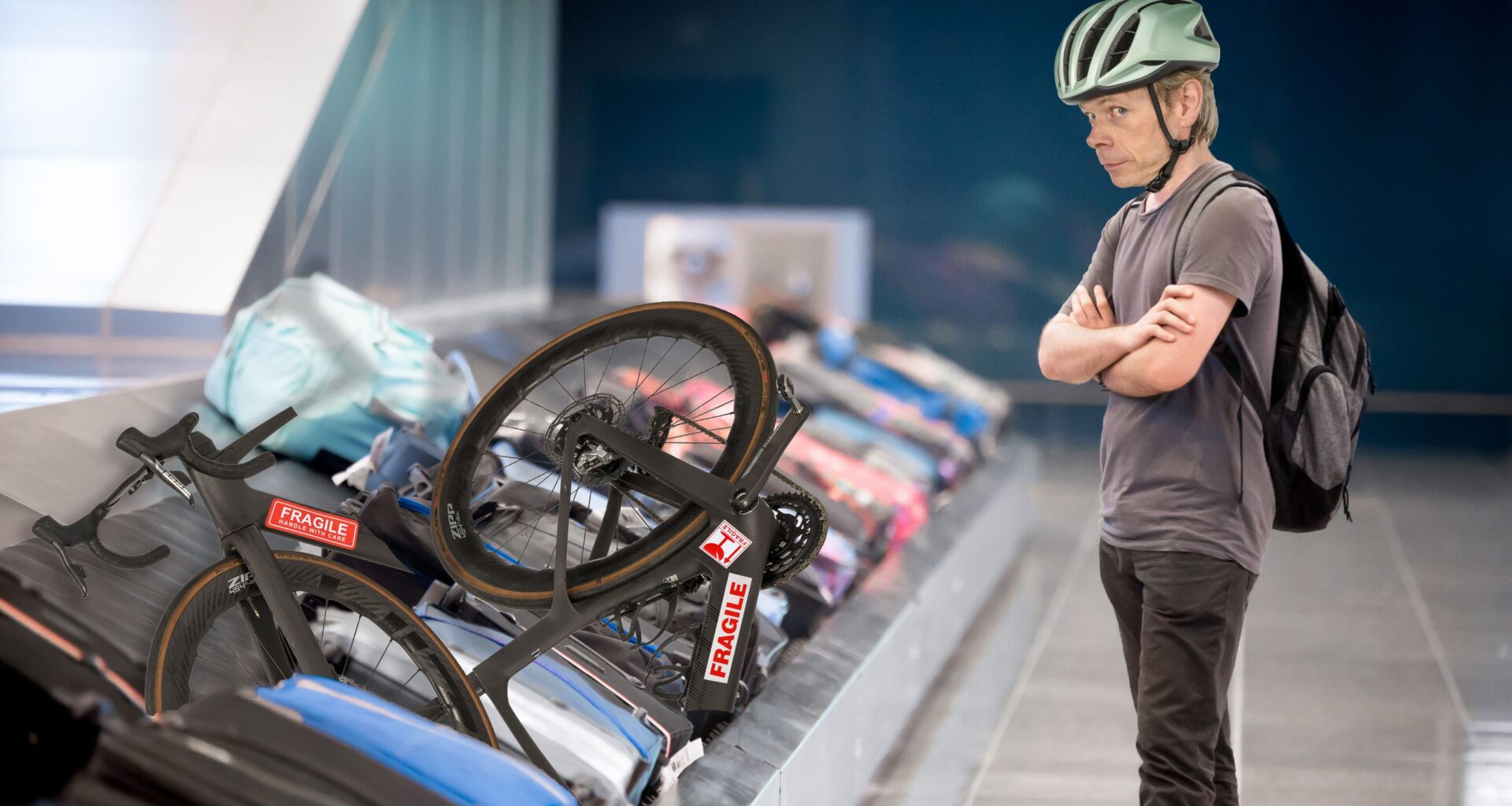 'The airport is essentially a giant bike crushing machine' - Dr Hutch runs his steed through the airport baggage gauntlet