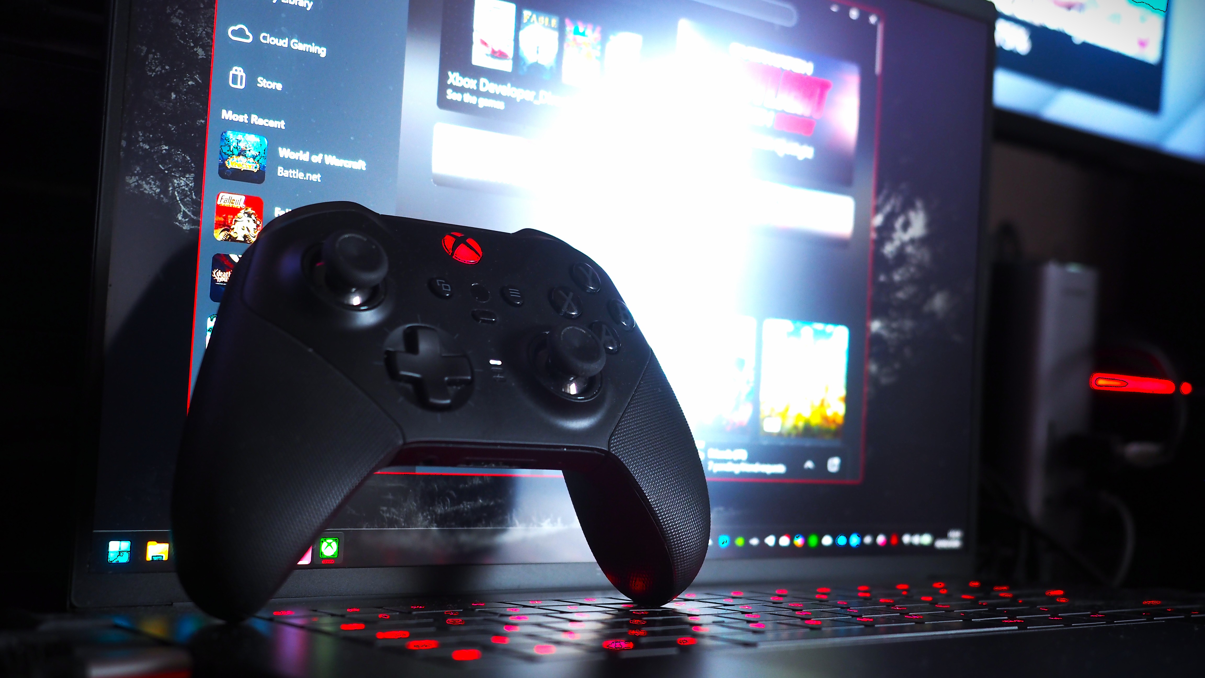 Xbox controller on a Razer Blade laptop with the Xbox app open