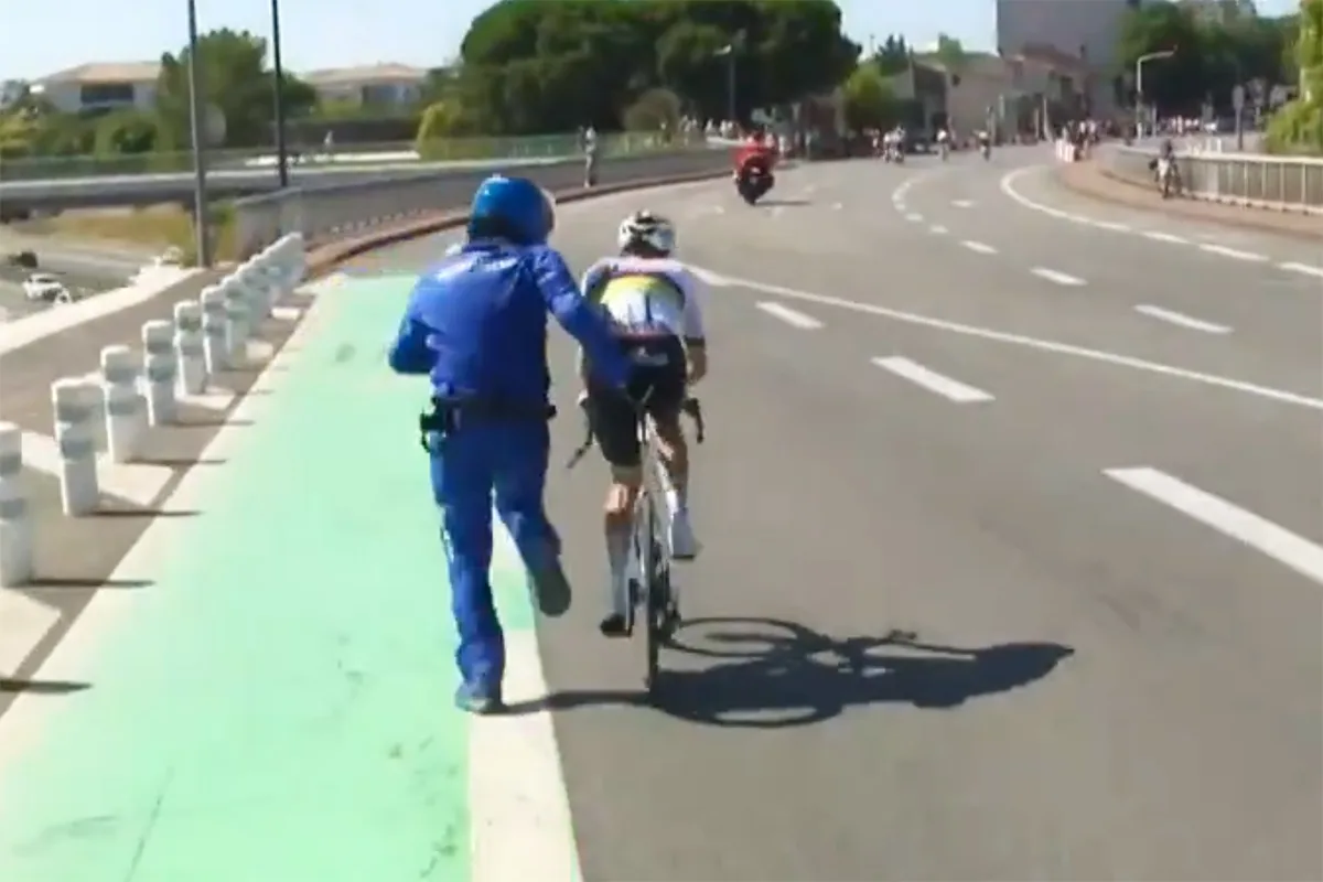 Tadej Pogačar being helped by Shimano neutral service at the 2025 Tour de France