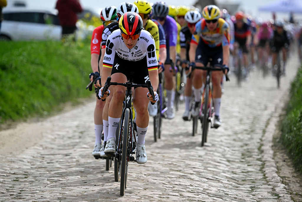 Franziska Koch leads the peloton over a cobbled sector during Paris-Roubaix 2026