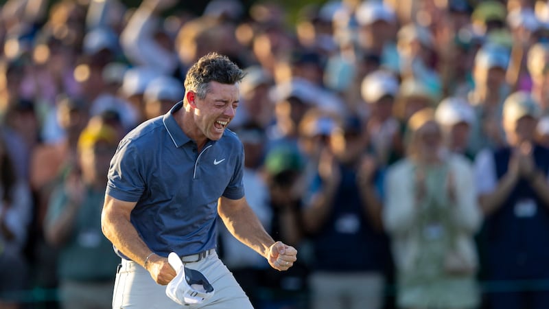 Masters champion Rory McIlroy of Northern Ireland celebrates on the 18th green. Photograph: Kieran Cleeves/Augusta National/Getty