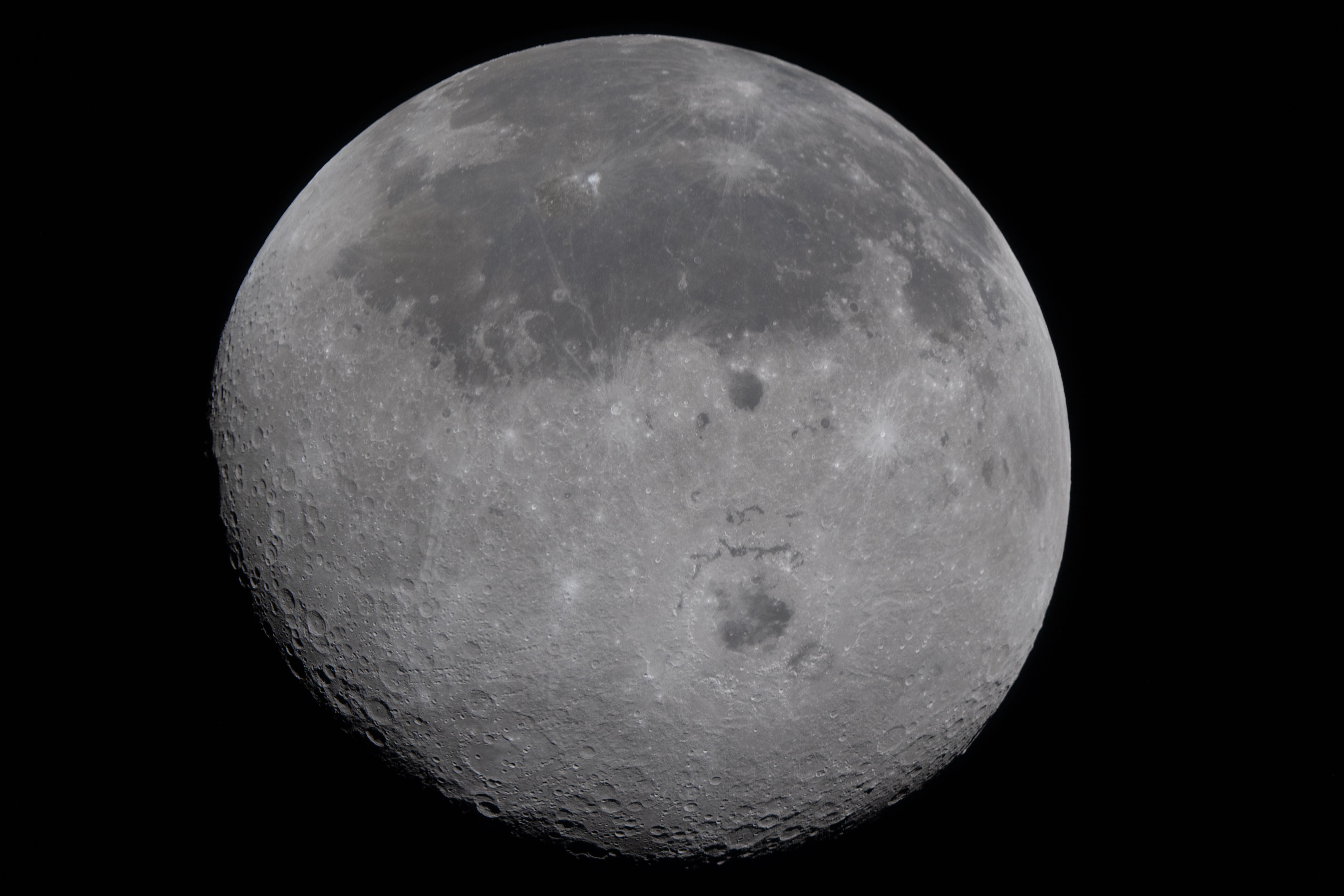 This image provided by Nasa on Monday, 6 April 2026, shows the Moon, the near side (the hemisphere we see from Earth) visible at the top half of the disk, identifiable by the dark splotches. At the lower centre is Orientale basin, a nearly 600-mile-wide crater that straddles the Moon’s near and far sides. Everything below the crater is the far side