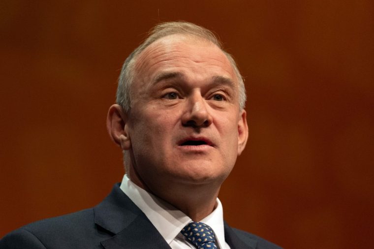 BOURNEMOUTH, ENGLAND - SEPTEMBER 23: Ed Davey, leader of the Liberal Democrats, delivers his keynote speech on the fourth and final day of the Liberal Democrat annual conference at the Bournemouth International Centre on September 23, 2025 in Bournemouth, England. (Photo by Carl Court/Getty Images)