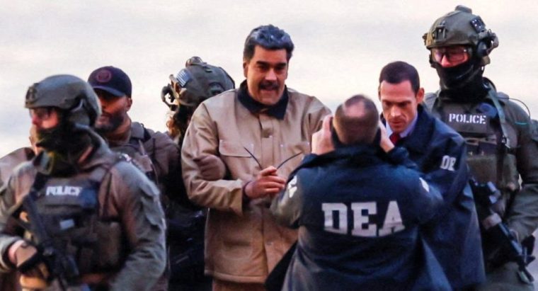 Captured Venezuelan President Nicolas Maduro arrives at the Downtown Manhattan Heliport, as he heads towards the Daniel Patrick Moynihan United States Courthouse in Manhattan for an initial appearance to face U.S. federal charges including narco-terrorism, conspiracy, drug trafficking, money laundering and others in New York City, U.S., January 5, 2026. REUTERS/Eduardo Munoz BEST QUALITY AVAILABLE TPX IMAGES OF THE DAY