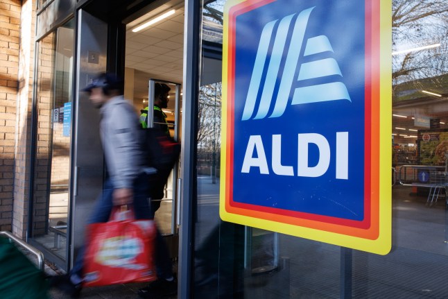 epa12704652 People leave an Aldi supermarket in east London, Britain, 04 February 2026. According to 'Which?' consumer group's analysis, Aldi has beaten Lidl and Asda to be the cheapest supermarket, compared to eight of the UK's major supermarkets in January 2026. EPA/TOLGA AKMEN