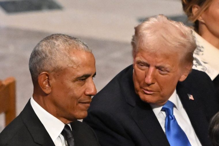 US President-elect Donald Trump speaks with former President Barack Obama as they attend the State Funeral Service for former US President Jimmy Carter at the Washington National Cathedral in Washington, DC, on January 9, 2025. (Photo by Mandel NGAN / AFP) (Photo by MANDEL NGAN/AFP via Getty Images)