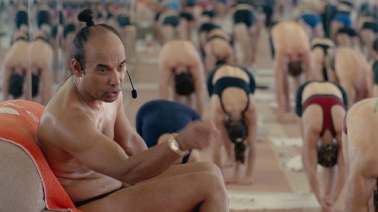 Bikram: Yogi, Guru, Predator_Bikram instructs his students. Bikram: Yogi, Guru, Predator TV still Netflix