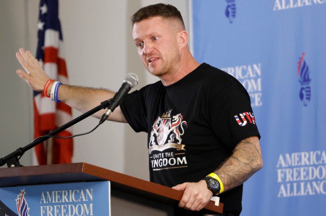 LOS ANGELES, CALIFORNIA - APRIL 15: British right-wing activist Tommy Robinson delivers a speech to the American Freedom Alliance at Luxe Sunset Boulevard Hotel on April 15, 2026 in Los Angeles, California. Robinson is currently on a multi-month visit to the United States which included a tour of the U.S. State Department in February. (Photo by Mario Tama/Getty Images)
