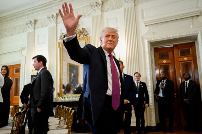 Mandatory Credit: Photo by Pool/ABACA/Shutterstock (16840196f) US President Donald Trump departs after speaking in the State Dining Room of the White House in Washington, DC, US, on Tuesday, April 21, 2026. The White House is hosting an event to honor NCAA collegiate national champions. President Trump Speaks In The State Dining Room Of The White House - DC - 21 Apr 2026