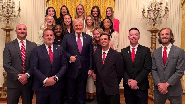 Trump and other men dominate White House photo celebrating women?s tennis team The Georgia Bulldogs tennis team was one of several NCAA champions invited to the White House on Tuesday to celebrate their wins.A photo posted by White House staffer Margo Martin showed the women gathered behind six men, including the president, who was standing slightly elevated on a step.