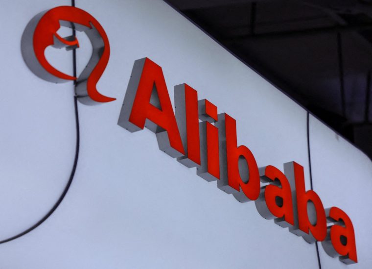 FILE PHOTO: An Alibaba logo is displayed at the company's booth at China International Fair for Trade in Services (CIFTIS) in Beijing, China, September 10, 2025. REUTERS/Maxim Shemetov/File Photo/File Photo