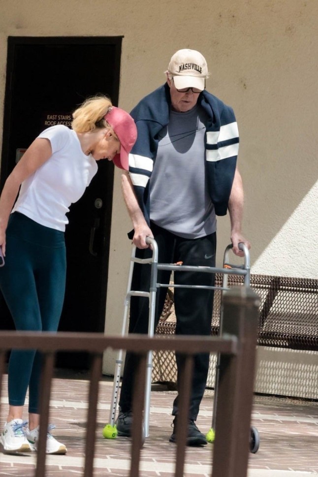 BGUK_3560866 - *PREMIUM-EXCLUSIVE* West Hills, CA MUST CALL FOR PRICING BEFORE USAGE - Former 'Baywatch' star David Hasselhoff, 73 looks frail as he was seen using a walker while out with his wife Haley Roberts in West Hills on April 22, 2026. Pictured: David Hasselhoff, Hayley Roberts BACKGRID UK 24 APRIL 2026 BYLINE MUST READ: WCP,4cnrs / BACKGRID UK: +44 208 344 2007 / uksales@backgrid.com USA: +1 310 798 9111 / usasales@backgrid.com *Pictures Containing Children Please Pixelate Face Prior To Publication*
