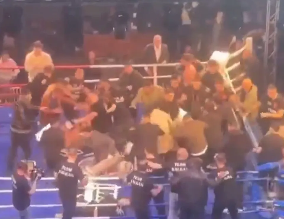 Fans in the ring brawling at a Turkish boxing event