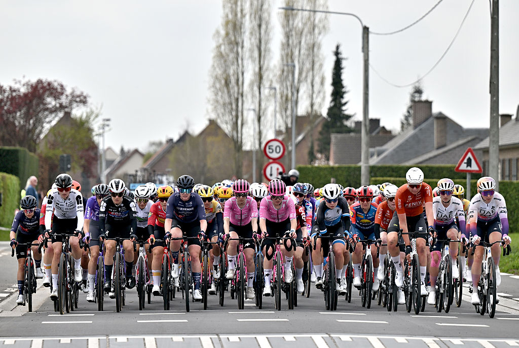 WAREGEM, BELGIUM - APRIL 01: A general view of the peloton competing during the 14th Dwars door Vlaanderen 2026 - Women's Elite a 128.8km one day race from Waregem to Waregem / #UCIWWT / on April 01, 2026 in Waregem, Belgium. (Photo by Luc Claessen/Getty Images)