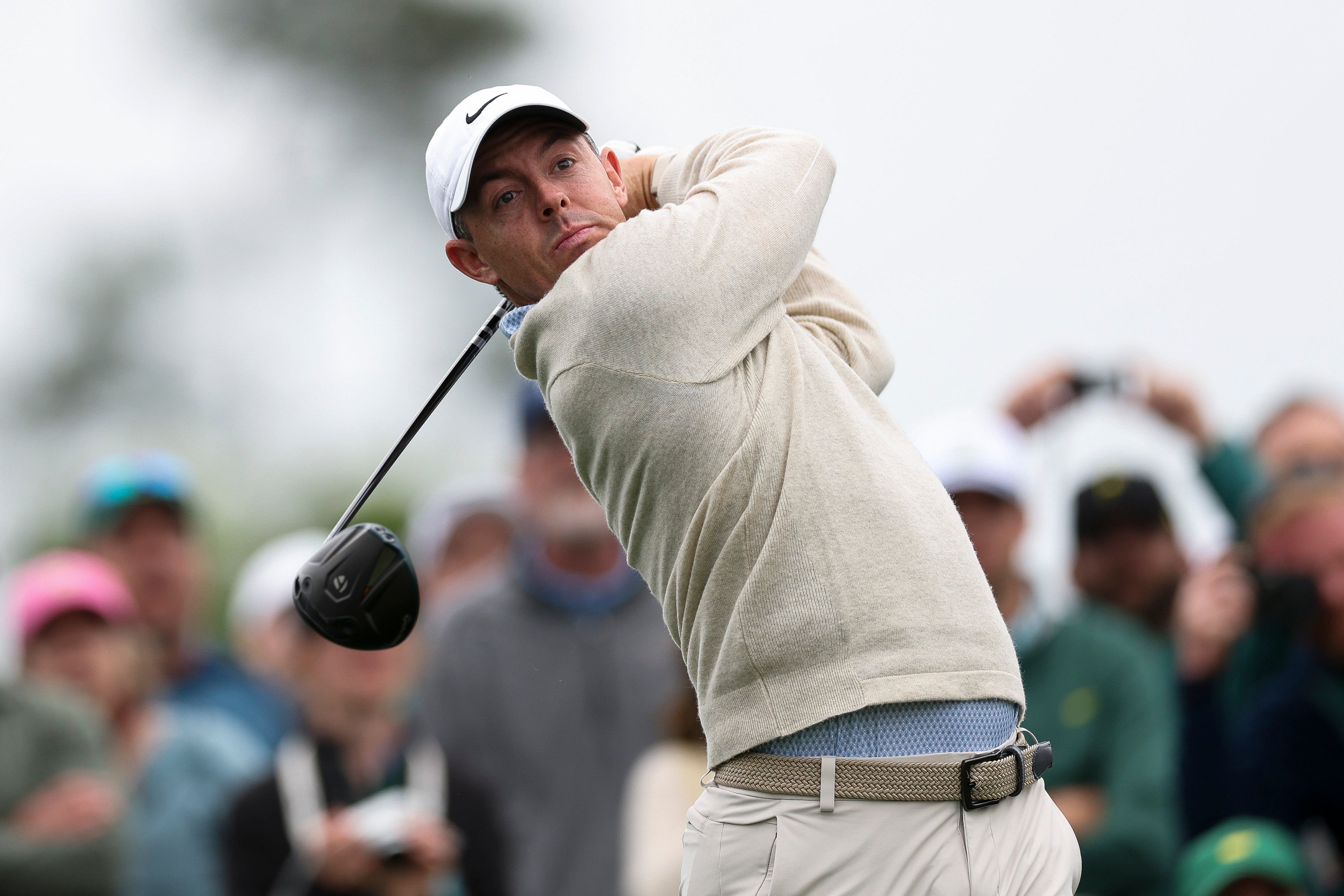 McIlroy plays a practice shot from the eighth tee ahead of the 2026 Masters