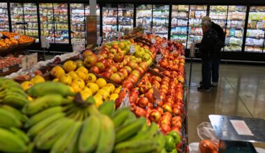 US economy grew a sluggish 0.5% in fourth quarter, government says, downgrading previous estimate